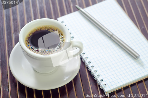 Image of coffee and note