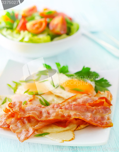 Image of Breakfast, bakon with salad and eggs