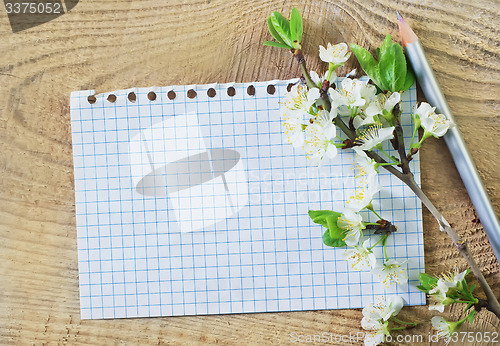 Image of flowers on wooden background