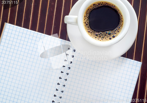 Image of coffee and note