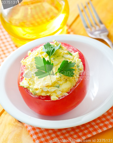 Image of Baked tomato with boiled eggs and cheese