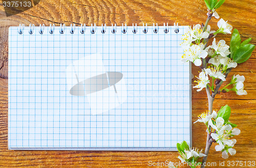 Image of flowers on wooden background
