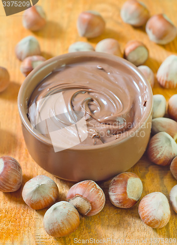 Image of creame with hazelnuts