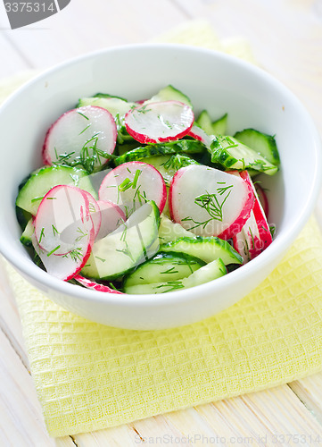 Image of fresh salad with cucumber and radish