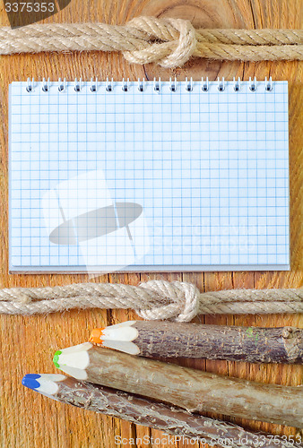 Image of note and pencil