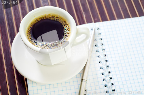 Image of coffee and note