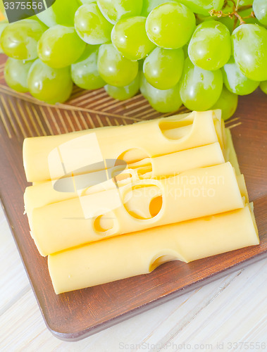 Image of cheese  and grape