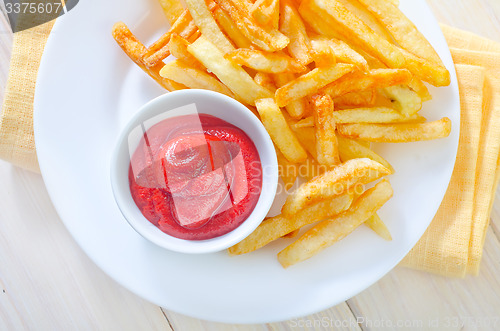 Image of potato fries with sauce