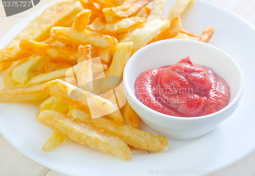 Image of potato fries with sauce