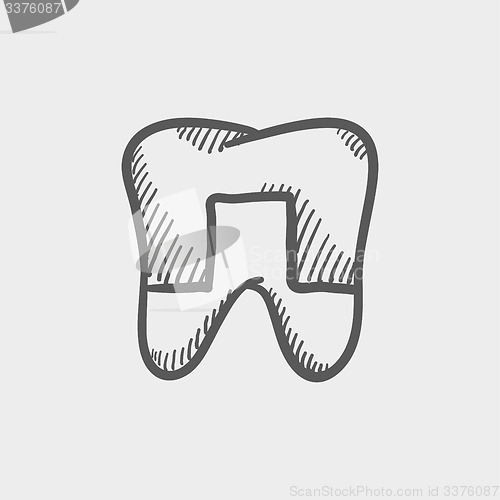 Image of Crowned tooth sketch icon