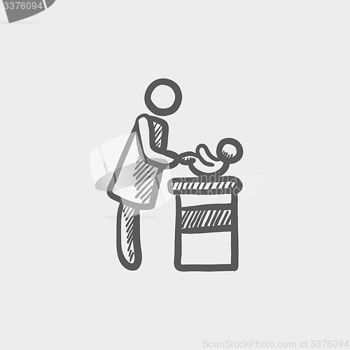 Image of Woman changing the babys diaper sketch icon