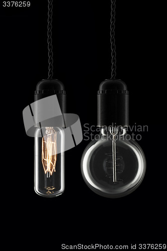 Image of A pair of retro bulbs one is turned on