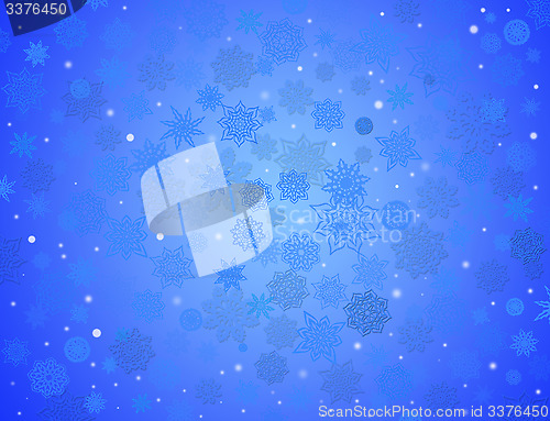 Image of fabulous snowflakes on the blue background