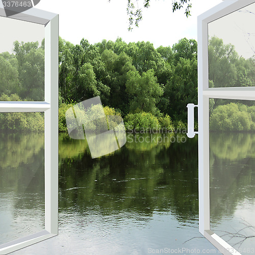 Image of opened window to the spring river