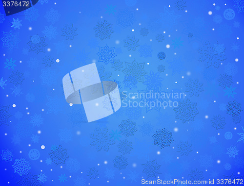 Image of white snowflakes on the blue background