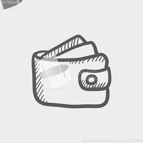 Image of Wallet with money and credit card sketch icon