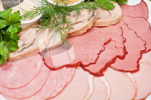 Image of meat, ham and sauce