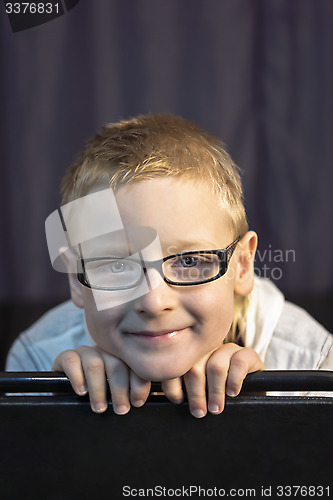 Image of Portrait of boy in glasses