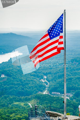 Image of chimney rock and american flag