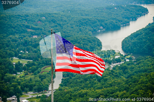 Image of chimney rock and american flag