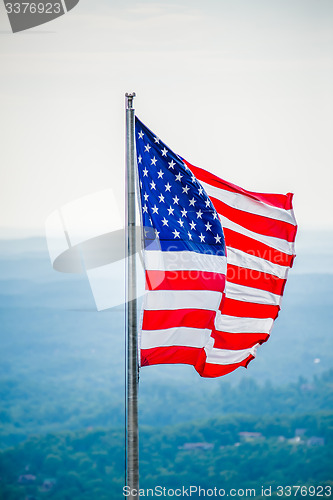 Image of chimney rock and american flag