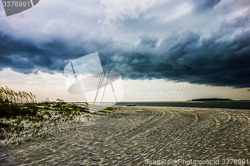 Image of tybee island beach scenes during rain and thunder storm