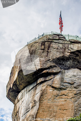 Image of chimney rock and american flag