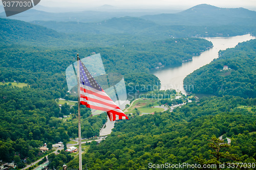 Image of chimney rock and american flag