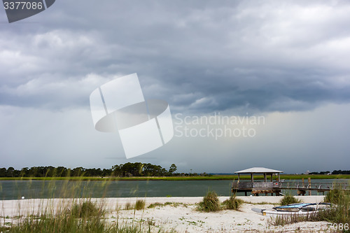 Image of tybee island beach scenes during rain and thunder storm