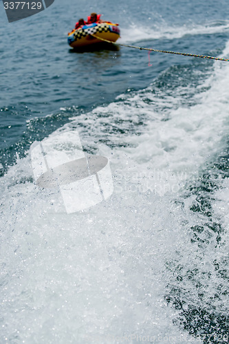 Image of water tubing on a lake