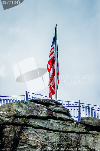 Image of chimney rock and american flag