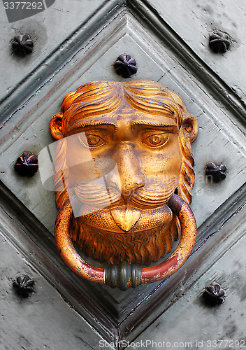 Image of Doorknocker on wooden door