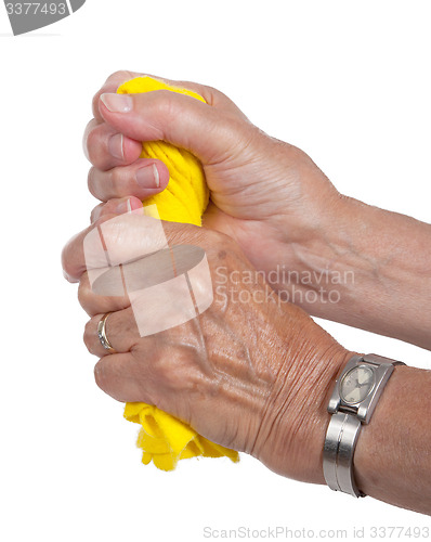 Image of Old woman cleaning