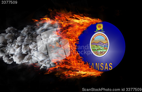 Image of Flag with a trail of fire and smoke - Kansas