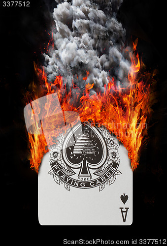 Image of Playing card with fire and smoke