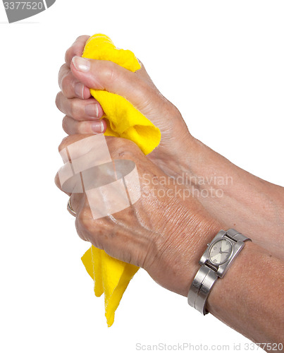 Image of Old woman cleaning