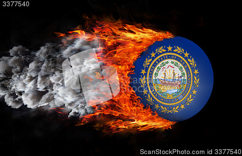 Image of Flag with a trail of fire and smoke - New Hampshire