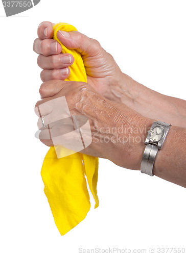 Image of Old woman cleaning