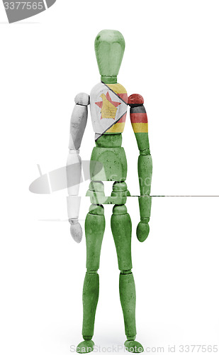 Image of Wood figure mannequin with flag bodypaint - Zimbabwe