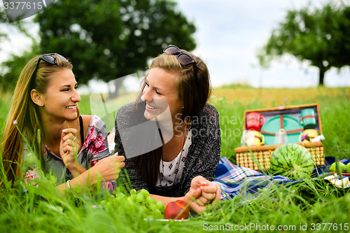 Image of Best friends having a picnic