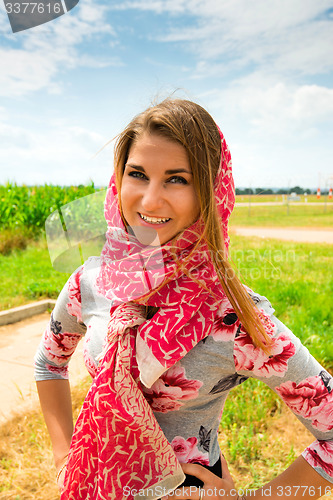 Image of Beautiful Young Woman Outdoors