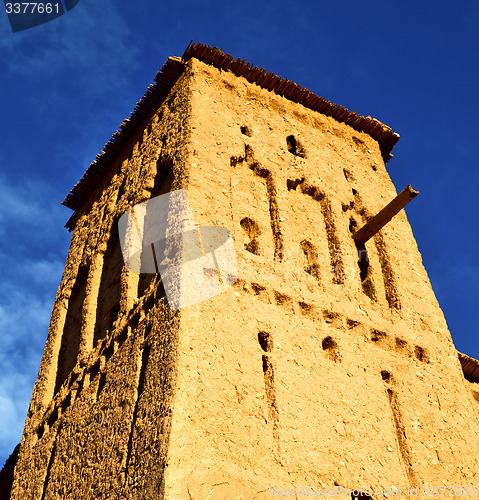 Image of africa  in histoycal maroc  old construction  and the blue cloud