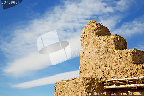 Image of brown old  construction in  africa morocco and  clouds  