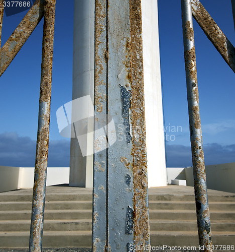 Image of step lighthouse and rock