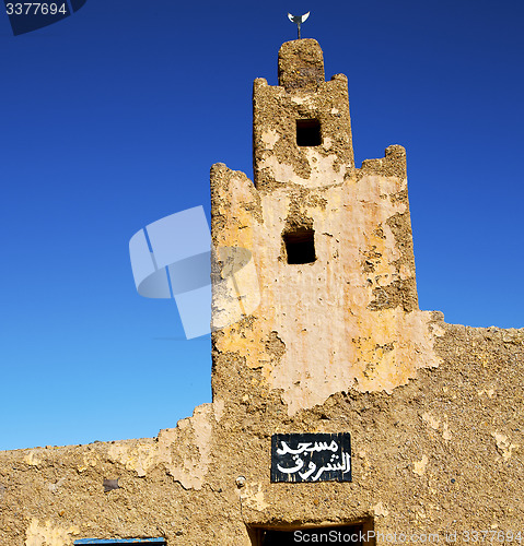 Image of old brown construction in africa   morocco and sky  near the tow