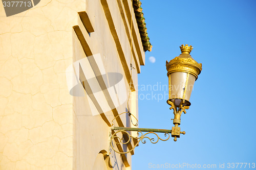 Image of  street lamp in morocco africa moon