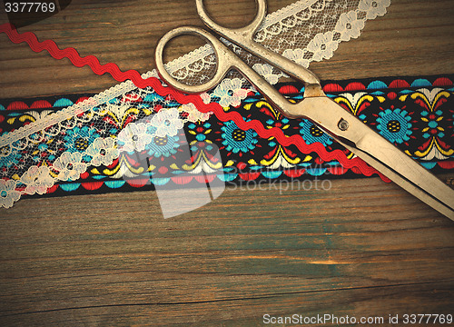 Image of Still tailor. vintage scissors and antique ribbons