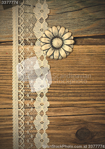 Image of vintage button and lace tape