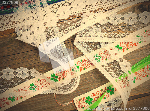 Image of vintage ribbons, tape and lace