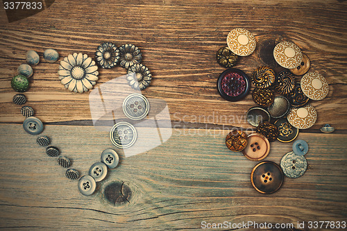 Image of vintage buttons heart and buttons pile